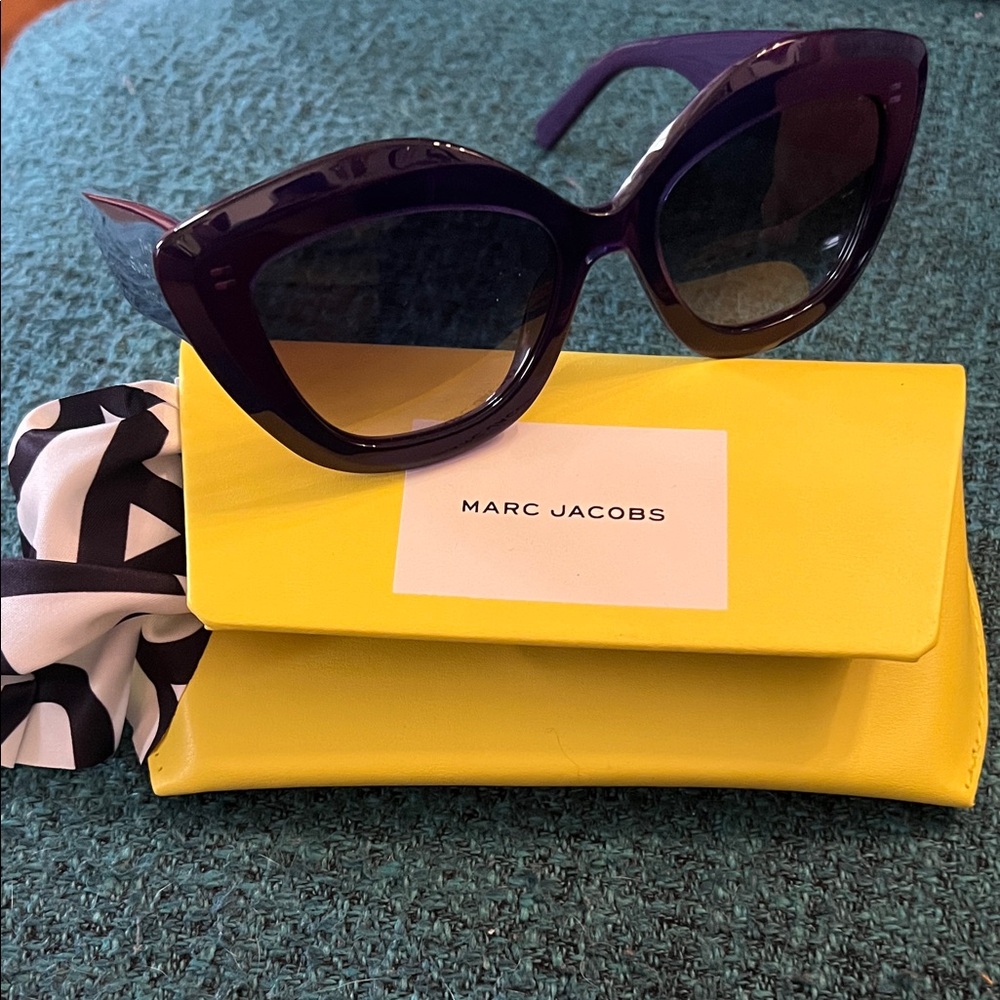 Marc Jacobs Dark Purple The Sunglasses!! These are soooo good!